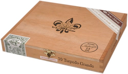 Buy Tatuaje 15th Anniversary Torpedo Grande Claro Online at Small Batch Cigar: This 6 1/2 x 52 torpedo comes in a habano rosado wrapper.