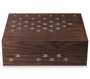 Buy Davidoff 50th Cave Des Ameriques Humidor Online: Davidoff has collaborated with Léger on a collection of four 50th anniversary "Caves du Monde" humidors, using her skills to inlay hand-woven fabrics into exceptional woods.