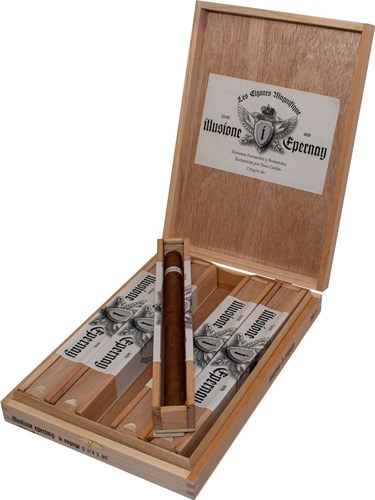Buy Illusione Epernay Le Voyage Online: First debuting in 2008, this cigar features a beautiful Nicaraguan Cafe Rosado wrapper over nicaraguan binders and fillers.  The cigar will greet the smoker with notes of coffee, cedar, nuts, creamy sweetness, and spices, leaving a balanced, complex experience any cigar smoker would enjoy.