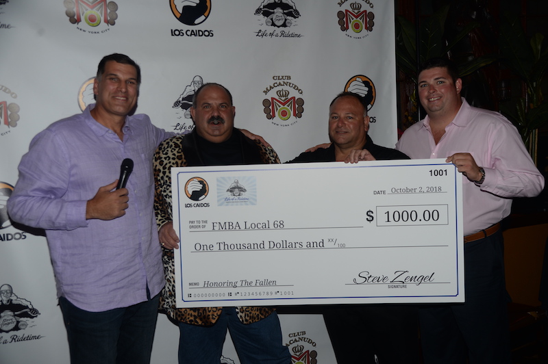 Los Caidos gives $1 for every cigar to families of fallen Police Officers and Firefighters